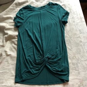 Dark green. Gorgeous color. Looks amazing on red heads
